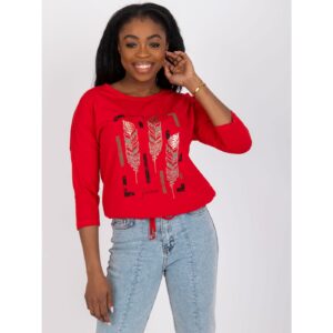 A red casual blouse with an Agnese