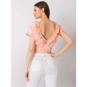 Peach blouse with a neckline on the