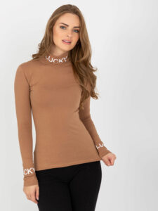 Light brown cotton turtleneck blouse with long sleeves
