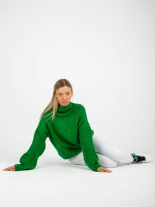 Green turtleneck sweater with wide sleeves
